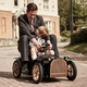 Illustration for article titled This Obscene $3,000 Stroller Will Teach Your Kid To Drive Before They Can Walk